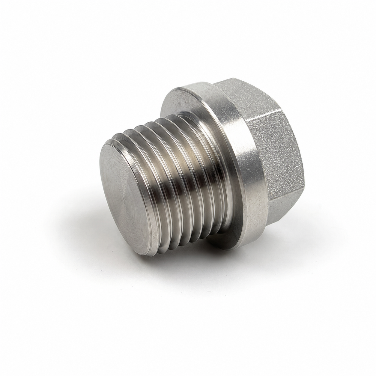 Tapón hexagonal de acero inoxidable dúplex 2507 individual que muestra la rosca macho y el acabado mecanizado.