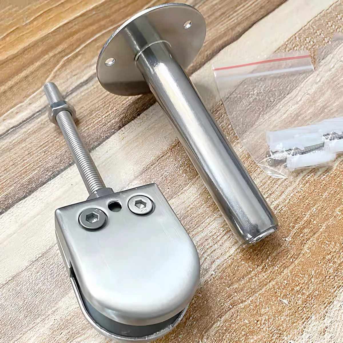 Disassembled adjustable glass support bracket with clamp threaded rod tube and anchors