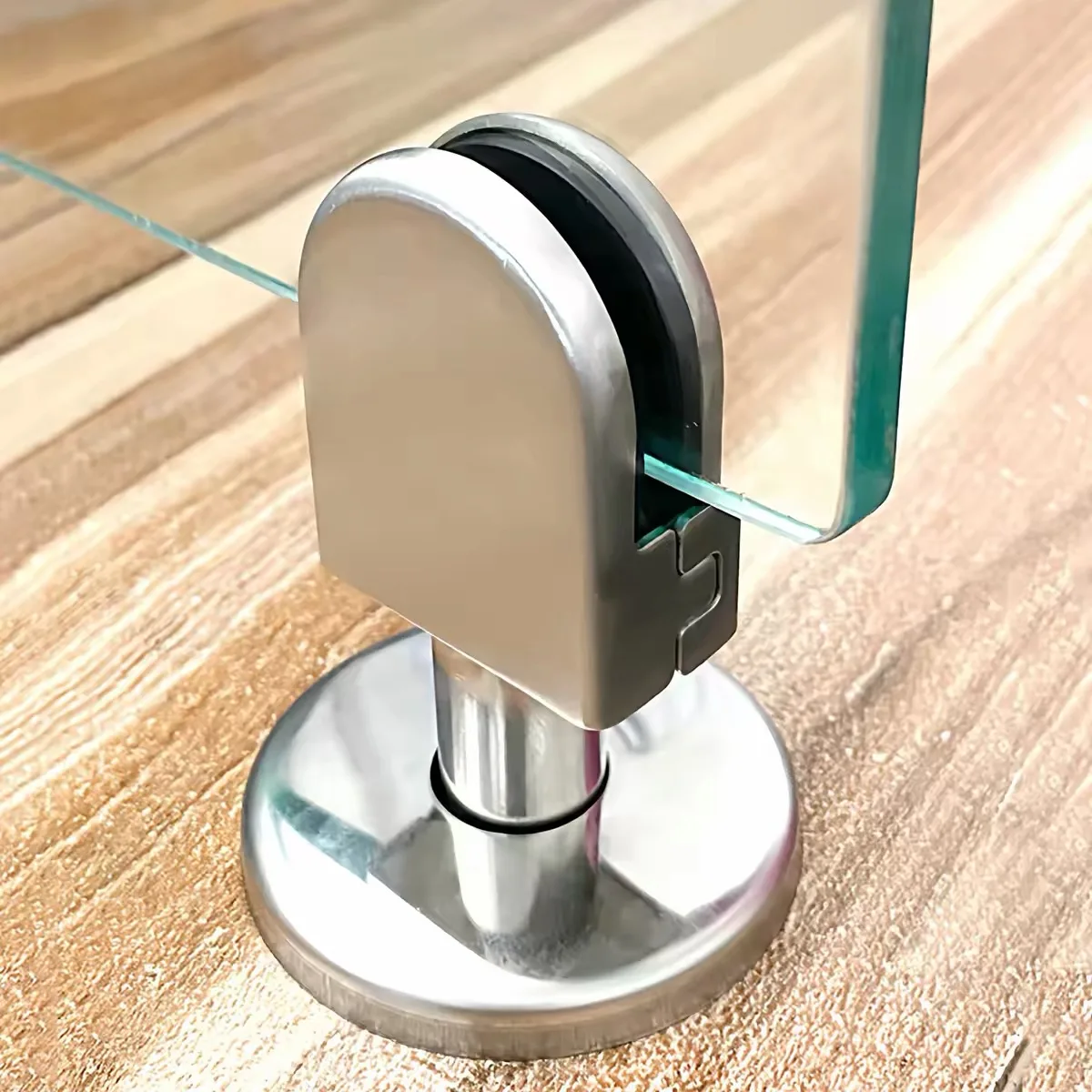 Stainless steel floor-mounted glass panel clamp with protective gasket