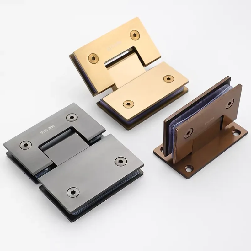 Close-up of stainless steel shower hinge clamp plates, gaskets, and mounting holes