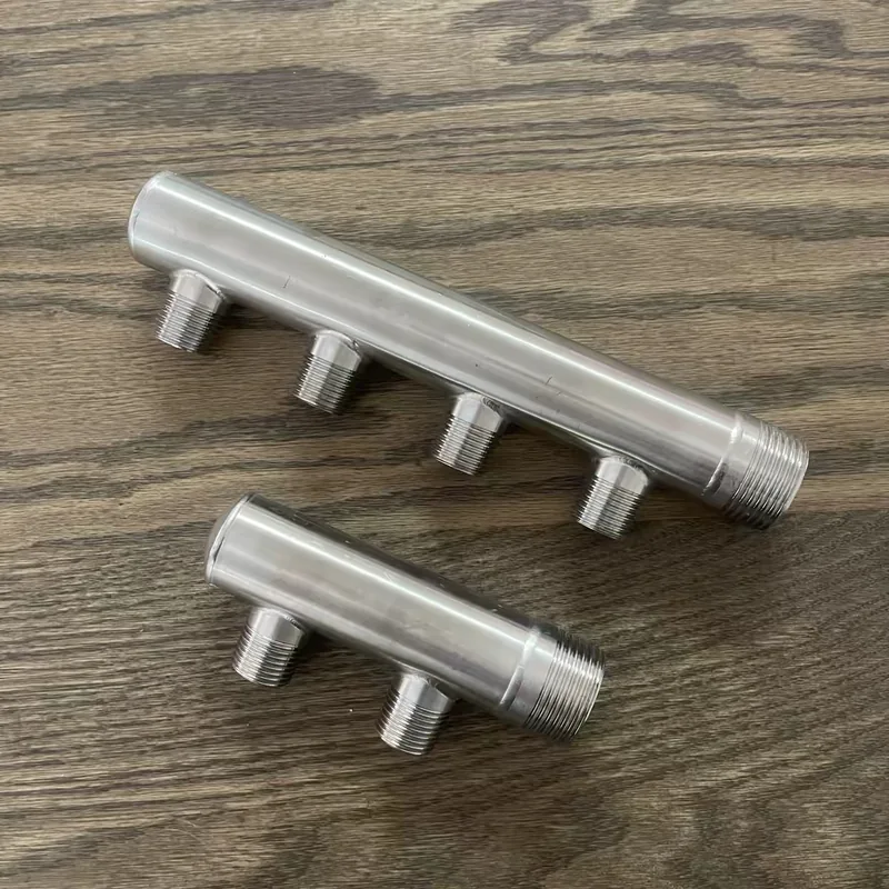Two-outlet and four-outlet threaded water distribution manifolds for sizing comparison